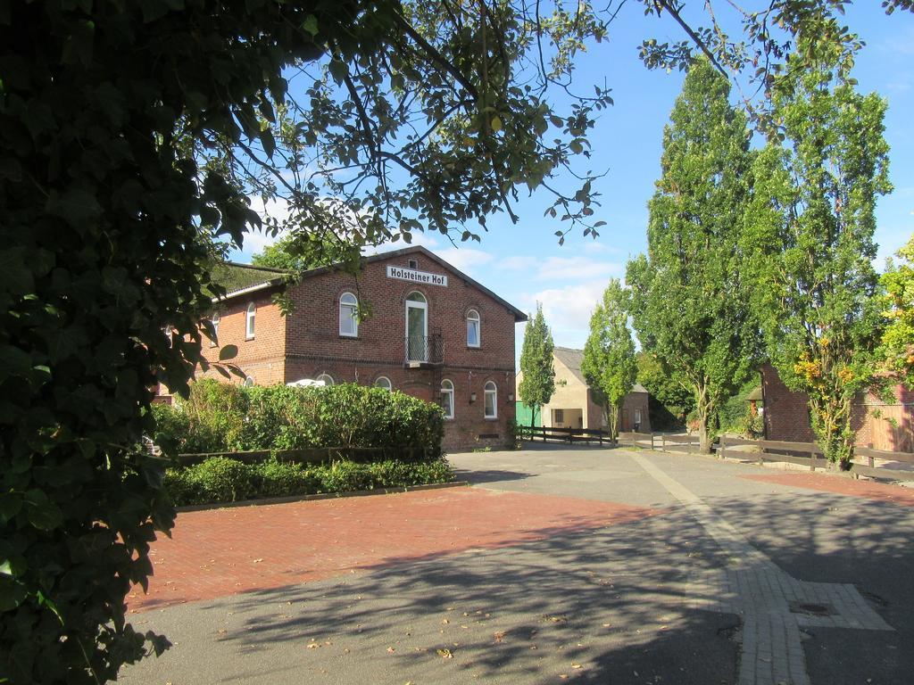 Holsteiner Hof Hotel Heist Bagian luar foto